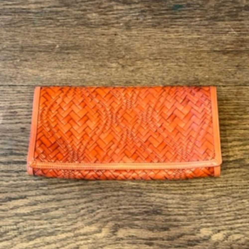 Cole Haan orange woven clutch